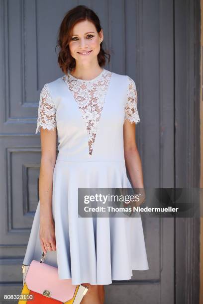 Actress Katrin Hess wearing a light blue dress is seen during the Mercedes-Benz Fashion Week Berlin Spring/Summer 2018 at Kaufhaus Jandorf on July 4,...