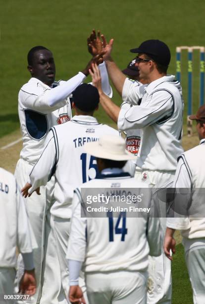 Robert Joseph of Kent is congratulated by team mates after he bowled out Chris Nash of Sussex during the LV County Championship match between Sussex...