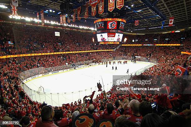 Calgary Flames fans in the 'C of Red' cheer for their team after time runs out on the clock during game six of the 2008 NHL Stanley Cup Playoffs...