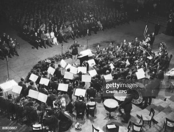 The Milwaukee American Legion Band perform at the Berlin Sports Palace, to honour the recently deceased German President Paul von Hindenburg, 22nd...