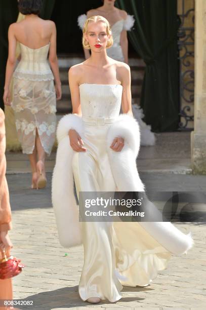 Model walks the runway at the Ulyana Sergeenko Autumn Winter 2017 fashion show during Paris Haute Couture Fashion Week on July 4, 2017 in Paris,...