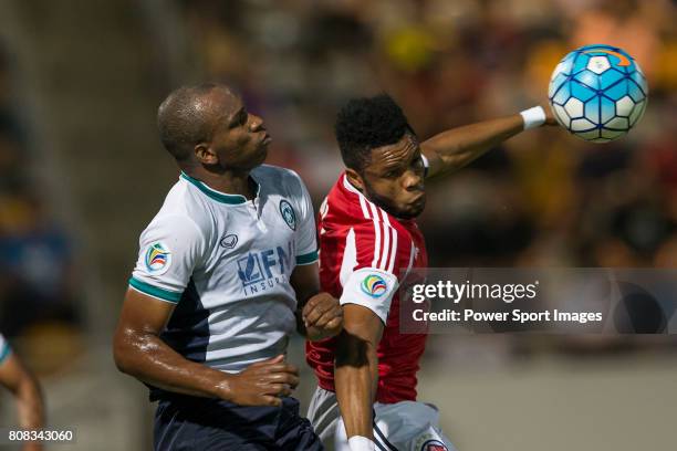 Yangon United forward Adilson Dos Santo fights for the ball with South China midfielder Mahama Awal during the AFC Cup 2016 Group Stage Match Day 5...