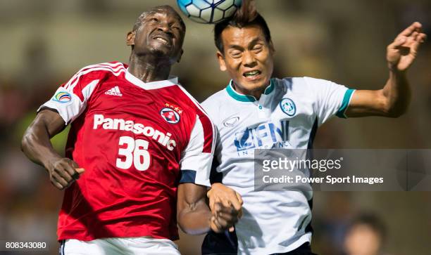 South China defender Agbo Wisdom Fofo fights for the ball with Yangon United defender Zaw Min Tun during the AFC Cup 2016 Group Stage Match Day 5...