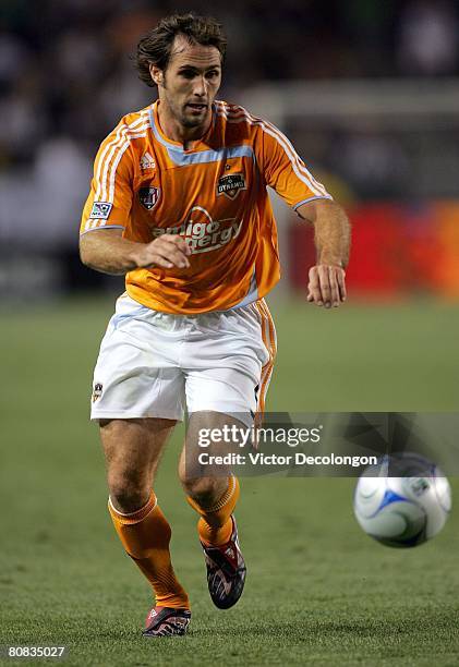 Brian Mullan of the Houston Dynamo paces the ball on the attack in the first half during their MLS game against the Los Angeles Galaxy at the Home...