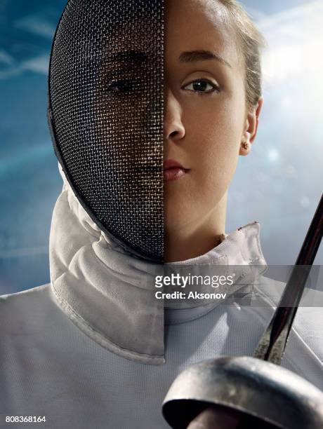 fencer portrait with half face masked - half full stock pictures, royalty-free photos & images