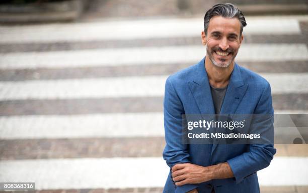 portrait of handsome smiling man - grey suit stock pictures, royalty-free photos & images