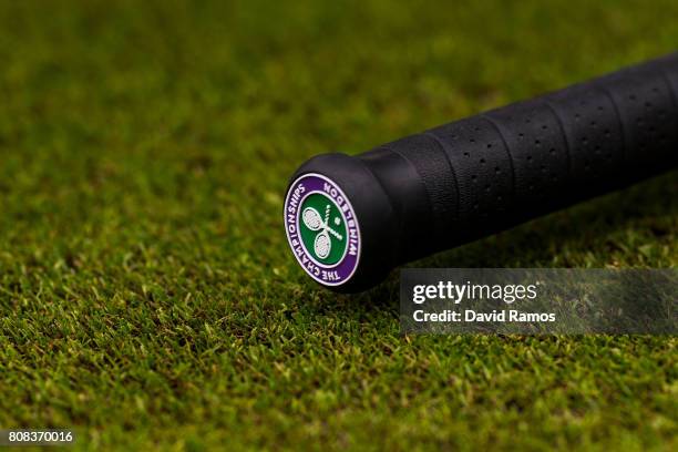 Wimbledon's logo is seen on an umbrella on day two of the Wimbledon Lawn Tennis Championships at the All England Lawn Tennis and Croquet Clubon July...