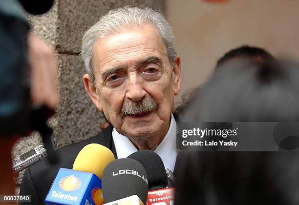 Argentine poet Juan Gelman pose for photographers prior to the Cervantes Prize ceremony, held at Alcala de Henares University on April 23, 2008 in...