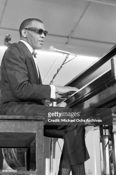 Pianist and entertainer Ray Charles performs onstage with his orchestra at Sound Blast '66 at Yankee Stadium on June 10, 1966 in New York City, New...