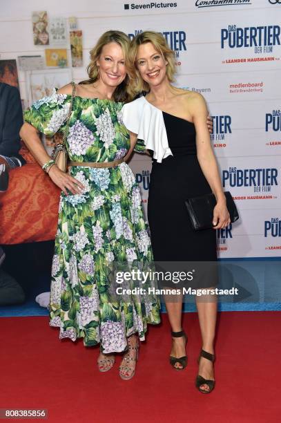 Actress Monika Gruber and Heike Makatsch during the ''Das Pubertier'' premiere at Mathaeser Filmpalast on July 4, 2017 in Munich, Germany.
