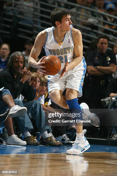 Eduardo Najera of the Denver Nuggets moves the ball during the NBA game against the Sacramento Kings on April 5, 2008 at the Pepsi Center in Denver,...