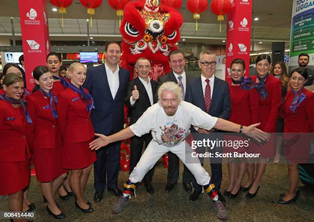 Sir Richard Branson poses with Steven Ciobo, Minister for Trade, Tourism and Investment; John Borghetti, Virgin Australia Group CEO and Managing...