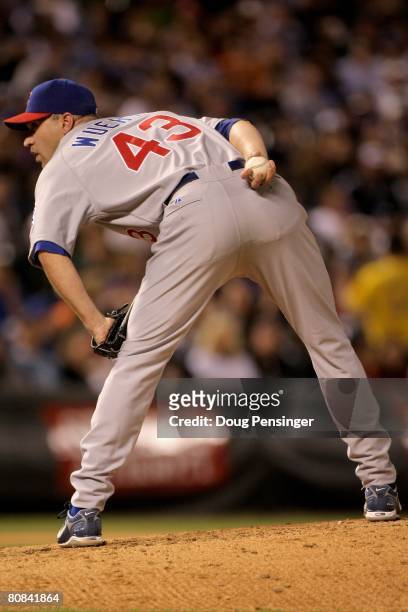 Pitcher Michael Wuertz of the Chicago Cubs prepares to deliver against the Colorado Rockies at Coors Field on April 23, 2008 in Denver, Colorado. The...