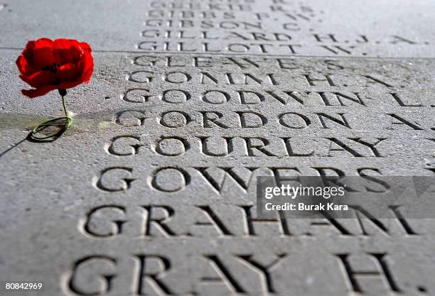 Poppy rests next to the names of the deceased at at Cape Helles British memorial during the 93nd anniversary of the World War I campaign of Gallipoli...