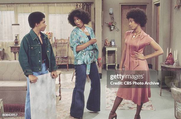 American actors, from left, Ralph Carter, Ja'net DuBois, and BernNadette Stanis in a scene from the television series 'Good Times,' Los Angeles,...