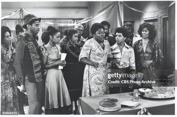 Scene from an episode of the television series 'Good Times' entitled 'The Big Move Part 2,' Los Angeles, California, 1976. Pictured from left, front...