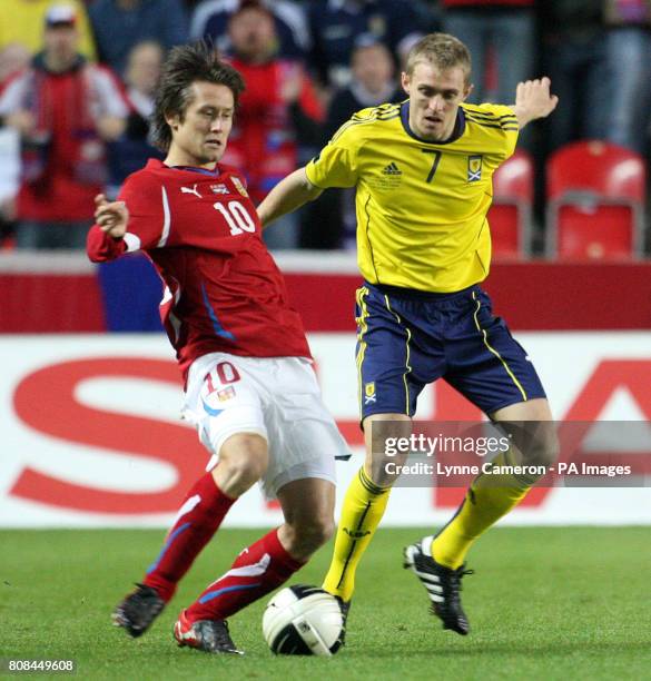 Czech Republic's Tomas Rosicky and Scotland's Darren Fletcher battle for the ball during the European Championship Qualifier, Group I match at the...