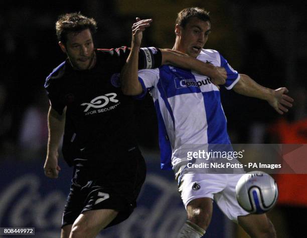 Aldershot's John Halls tussles for the ball with Bristol Rovers' Gary Sawyer during the Johnstone Paint Trophy match at the Memorial Stadium, Bristol.