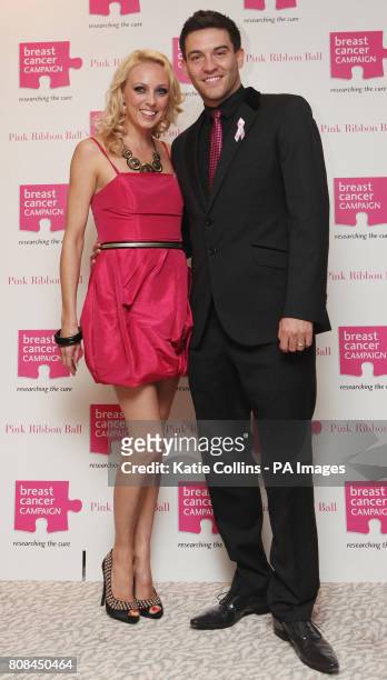 Camilla Dallerup and Kevin Sacre arrive at the Breast Cancer Campaign's annual Pink Ribbon Ball at the Dorchester in central London.