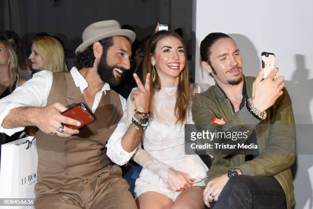Massimo Sinato, Ekaterina Leonova and Gil Ofarim attend the Ewa Herzog show during the Mercedes-Benz Fashion Week Berlin Spring/Summer 2018 at...