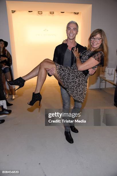 Julian David and Maren Gilzer attend the Ewa Herzog show during the Mercedes-Benz Fashion Week Berlin Spring/Summer 2018 at Kaufhaus Jandorf on July...