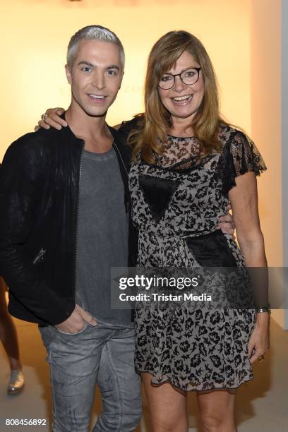 Julian David and Maren Gilzer attend the Ewa Herzog show during the Mercedes-Benz Fashion Week Berlin Spring/Summer 2018 at Kaufhaus Jandorf on July...