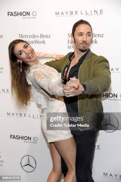 Ekaterina Leonova and Gil Ofarim attend the Ewa Herzog show during the Mercedes-Benz Fashion Week Berlin Spring/Summer 2018 at Kaufhaus Jandorf on...