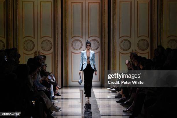 Zhenya Katava walks the runway during the Giorgio Armani Prive Haute Couture Fall/Winter 2017-2018 show as part of Haute Couture Paris Fashion Week...