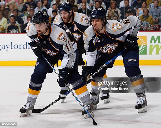 Jan Hlavac, Shea Weber and J.P. Dumont of the Nashville Predators face off against the Detroit Red Wings during game six of the conference...