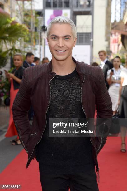 Julian David attends the Riani Fashion Show Spring/Summer 2018 at Umspannwerk Kreuzberg on July 4, 2017 in Berlin, Germany.