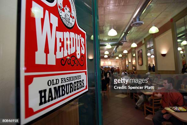 People eat in a Wendy's April 24, 2008 in New York City. Wendy's International Inc., which is the nation's No. 3 hamburger chain, was bought by...