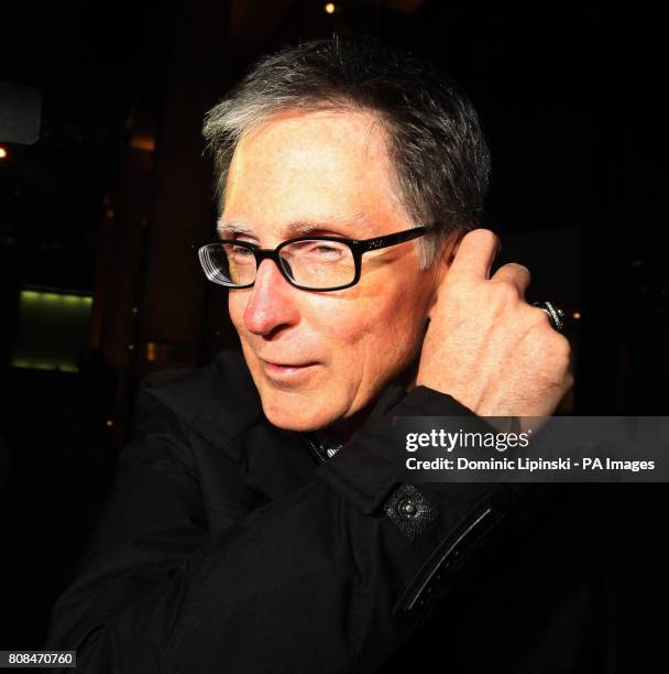 John W Henry leaves the offices of law firm Slaughter and May, in the city of London as the protracted takeover of Liverpool Football Club could...