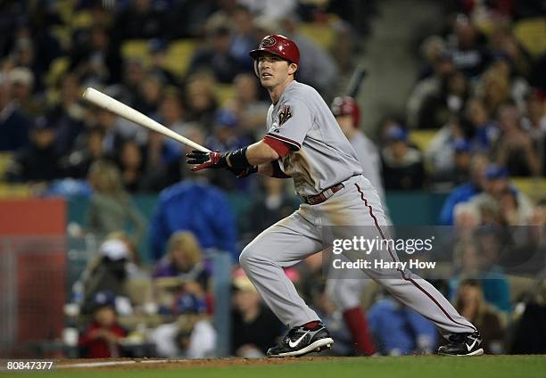 Stephen Drew of the Arizona Diamondbacks watches the ball after hitting into a pop fly for an out in the seventh inning against the Los Angeles...