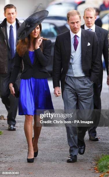 Prince William and Kate Middleton arrive at the wedding of their friends Harry Mead and Rosie Bradford in the village of Northleach, Gloucestershire.