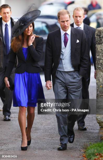 Prince William and Kate Middleton arrive at the wedding of their friends Harry Mead and Rosie Bradford in the village of Northleach, Gloucestershire.
