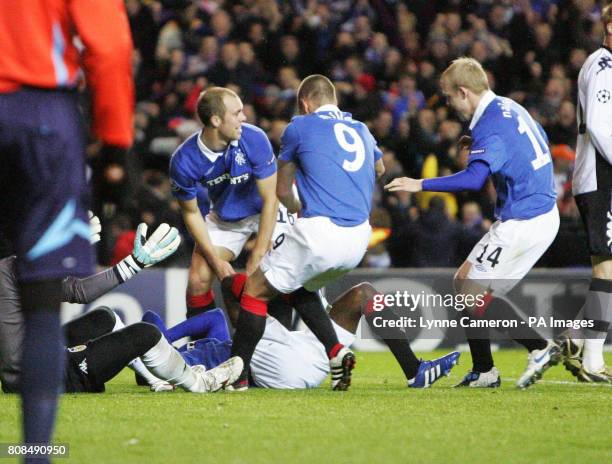 Rangers' Maurice Edu opens the scoring during the UEFA Champions League match at Ibrox, Glasgow.