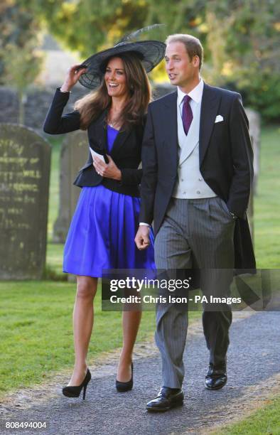 Prince William and Kate Middleton leave the wedding of their friends Harry Mead and Rosie Bradford in the village of Northleach, Gloucestershire.