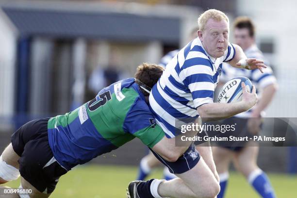 Heriots' Mark Lee tackled by Boroughmuir's Greig Scott during the Scottish Hydro Premiership, Division One match at Bangholm Terrace, Edinburgh.