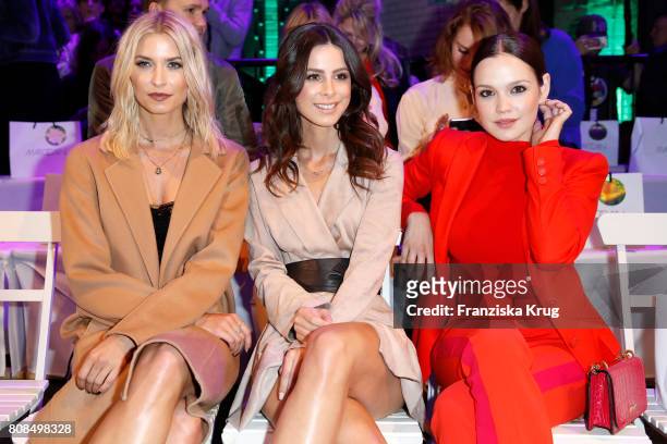 Lena Gercke, Lena Meyer-Landrut and Emilia Schuele attend the Marc Cain Fashion Show Spring/Summer 2018 at ewerk on July 4, 2017 in Berlin, Germany.