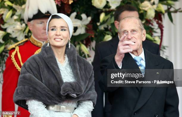 The Duke of Edinburgh and Sheikha Mozah bint Nasser Al-Missned , wife of the Emir of Qatar at Windsor Castle, Berkshire, during the Emir's state...