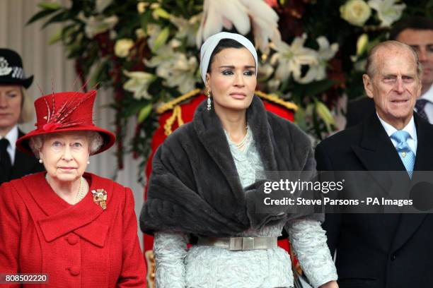 Sheikha Mozah bint Nasser Al-Missned , wife of the Emir of Qatar joins Queen Elizabeth II and the Duke of Edinburgh at Windsor Castle during the...