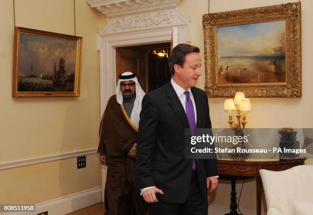 Prime Minister David Cameron meets the Emir of Qatar Sheikh Hamad bin Khalifa al-Thani at Downing St in London.