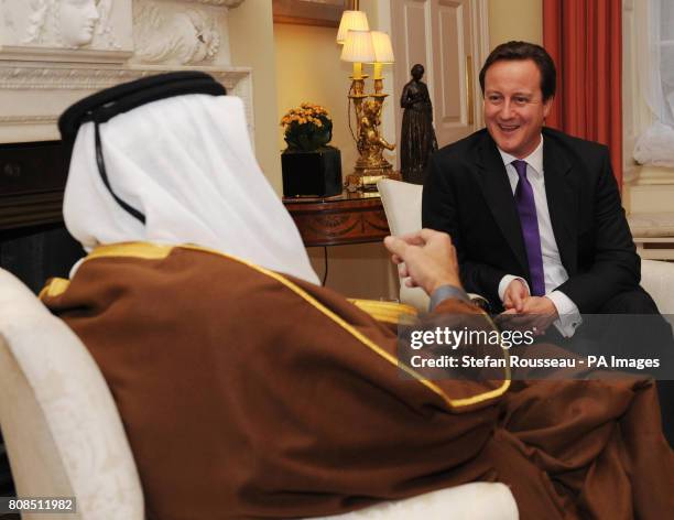 Prime Minister David Cameron meets the Emir of Qatar Sheikh Hamad bin Khalifa al-Thani at Downing St in London.