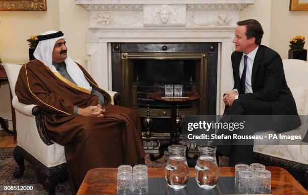 Prime Minister David Cameron meets the Emir of Qatar Sheikh Hamad bin Khalifa al-Thani at Downing St in London.