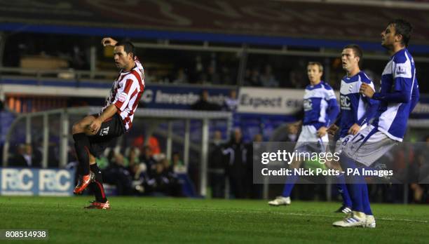 Brentford's Sam Wood scores the opening goal during the Carling Cup Fourth Round match at St Andrew's, Birmingham.