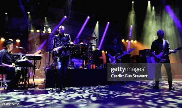 Jim Moginie, Peter Garrett Rob Hirst, Bones Hillman and Martin Rotsey of Midnight Oil perform at the Eventim Apollo on July 4, 2017 in London,...