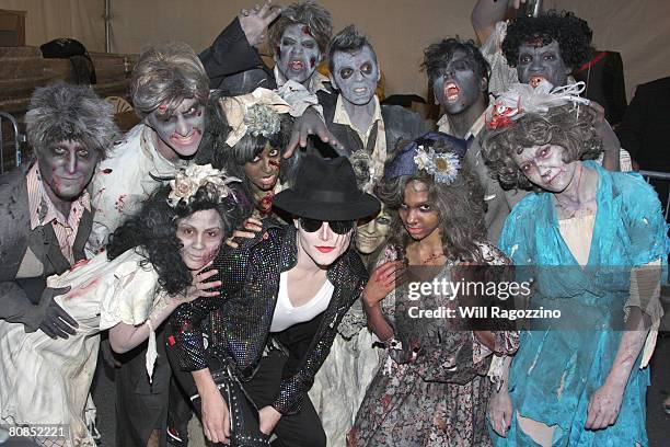 Michael Jackson impersonator Pete Carter poses with contestants from the Bravo TV series "Step It Up and Dance" at the drive-in presentation of...