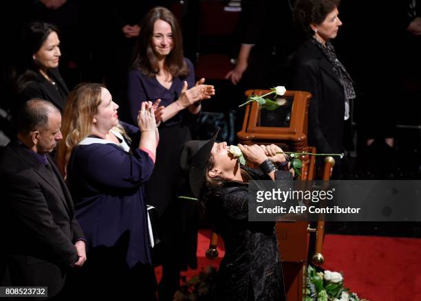 The daughters of Mexican painter and sculptor Jose Luis Cuevas Maria Jose, Mariana and Ximena take part in a ceremony in his honor at the Fine Arts...