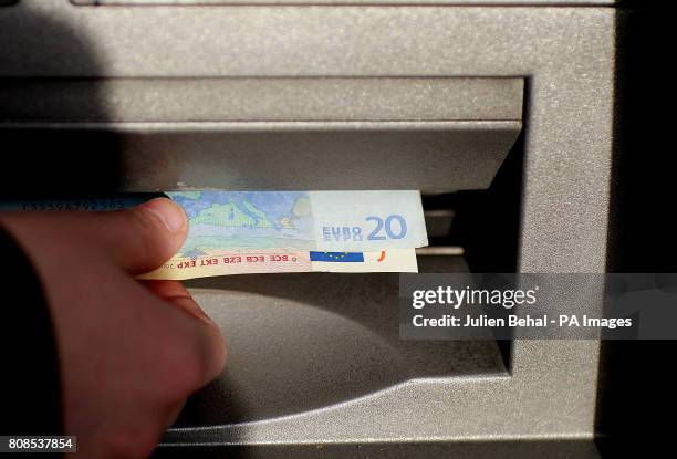 General view of an ATM withdrawal in Dublin, as Ireland's Finance Minister Brian Lenihan is to ask the government to apply for a bailout loan from...