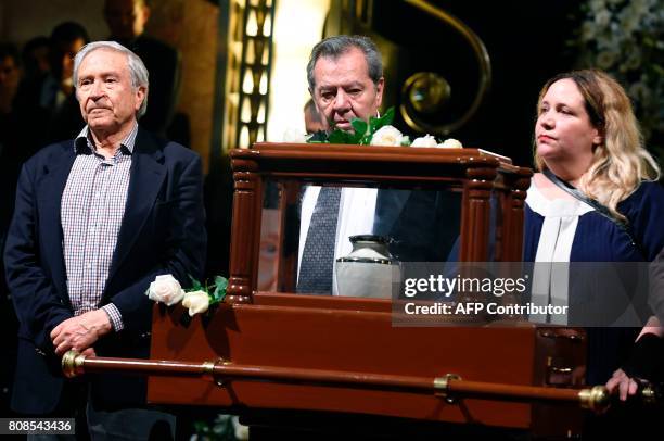 The daugther of Mexican painter and sculptor Jose Luis Cuevas, Maria Jose and Mexican poet and writer Homero Aridjis take part in a ceremony in honor...